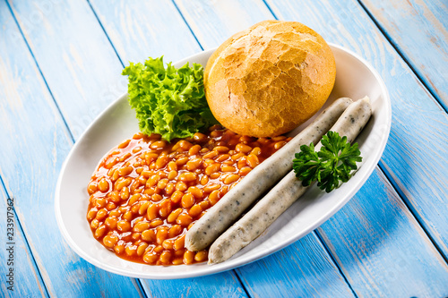 English breakfast - bun,sausages and beans photo