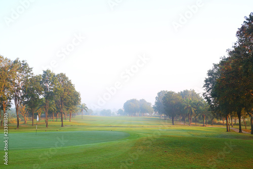 beautiful golf course at the sunset, sunrise time. © sittinan