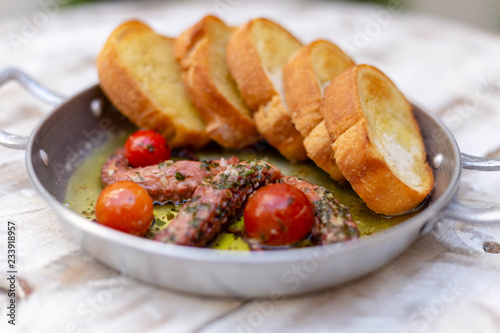 delicious octopus grilled with toasts