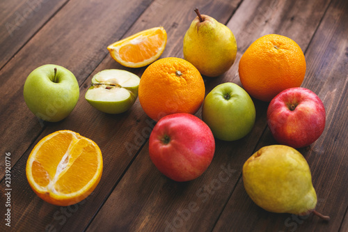 Ripe juicy fruit on a table made of wood