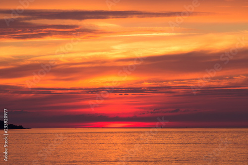 beautiful sunset sky over the baltic sea © Tomtsya
