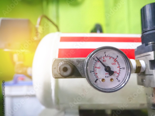 Close Up of air compressors pressure measurement pumps. photo