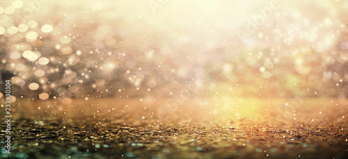 Golden abstract shiny light and glitter background