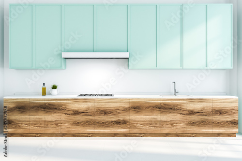 Kitchen with wooden and blue counters