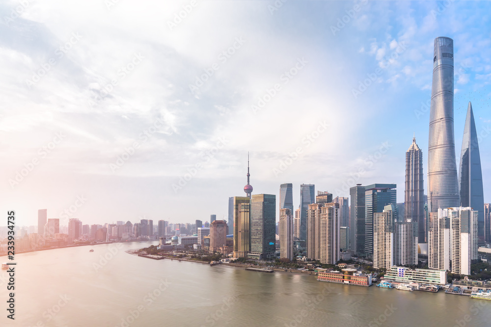 Naklejka premium Shanghai skyline and cityscape at sunset 