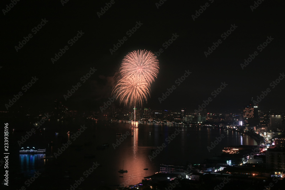 Firework at beach over Pattaya city , Chonburi province, Thailand Firework at beach over Pattaya city , Chonburi province, Thailand