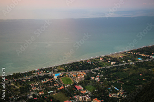 View of the Caspian Sea and city at sunset in the city of Ramsar, northern Iran