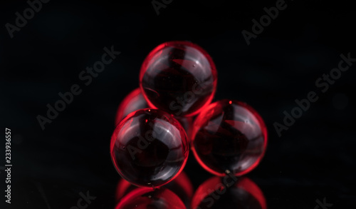 Small red medicine capsules containing nitroglycerin, validol