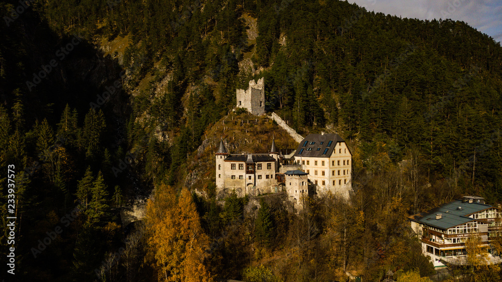 castle fernstein tyrol austria, drone photography of an old castle in Fernstein Austria, old castle on a hill, arial view on a castle, historical building castle fernstein tyrol austria, drone photography of an old castle in Fernstein Austria, old castle on a hill, arial view on a castle, historical building