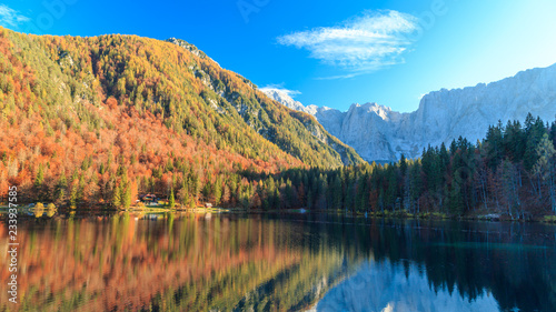 Colorful autumn foliage at the alpine lake