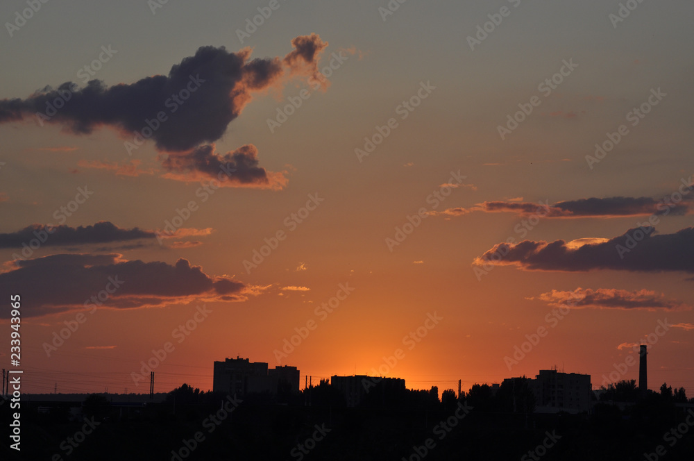 Magical view of gorgeous sunset over cityscape