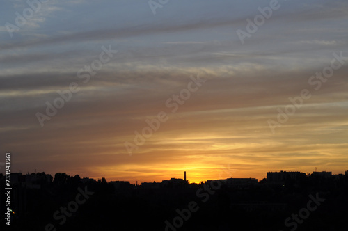 Magical view of gorgeous sunset over cityscape