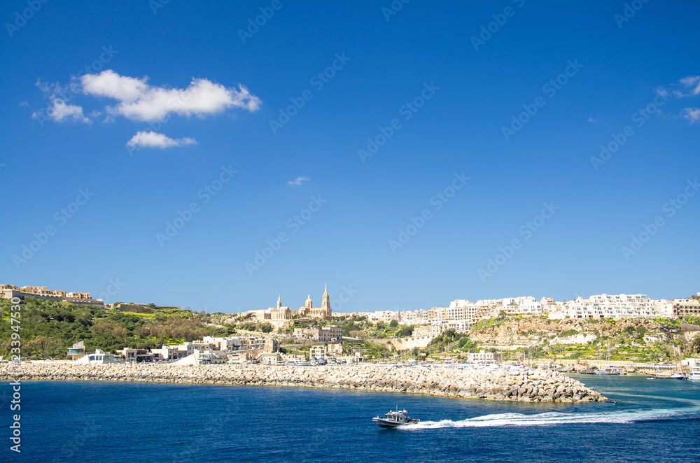 View of port village town Mgarr on Gozo island, Malta