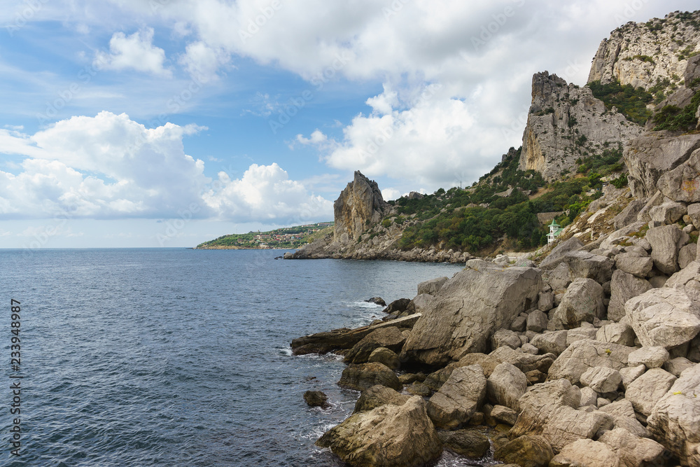 Southern coast of Crimea on a Sunny day. Rocks and mountain Cat in the village Simeiz, Yalta