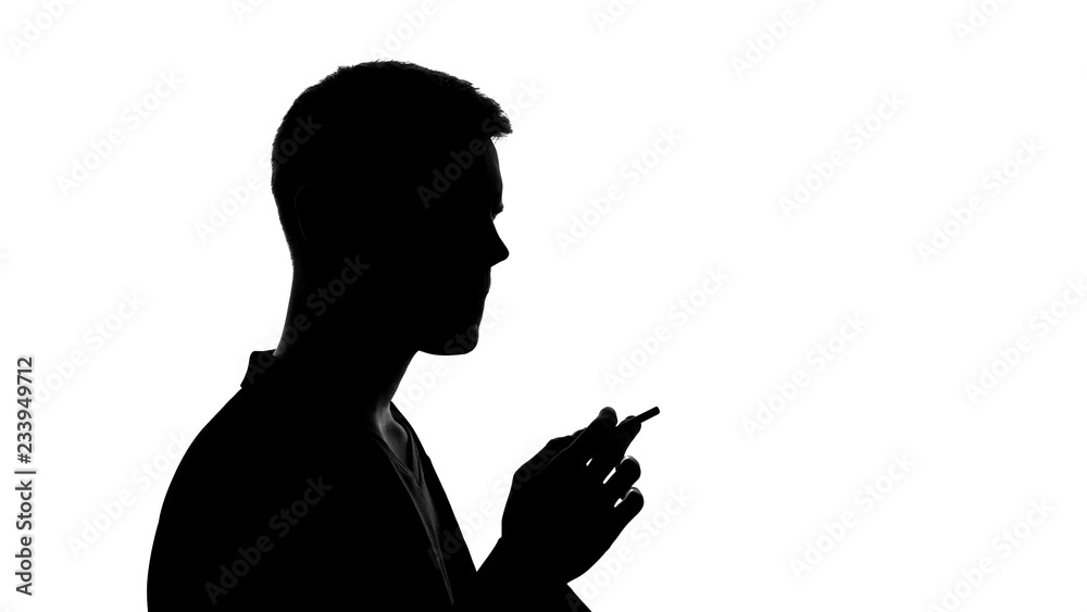 Male silhouette holding cigarette, unhealthy addiction, dangerous habit, cancer
