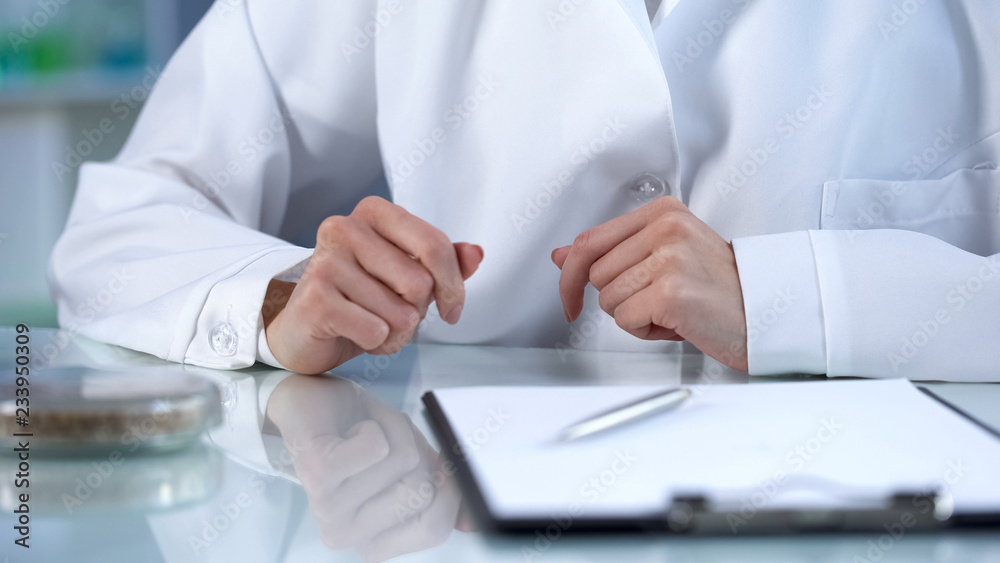 Scientist thinking over experiment results, nutrition quality control, research Scientist thinking over experiment results, nutrition quality control, research