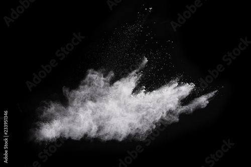 White powder explosion on white background. Colored cloud. Colorful dust explode. Paint Holi.