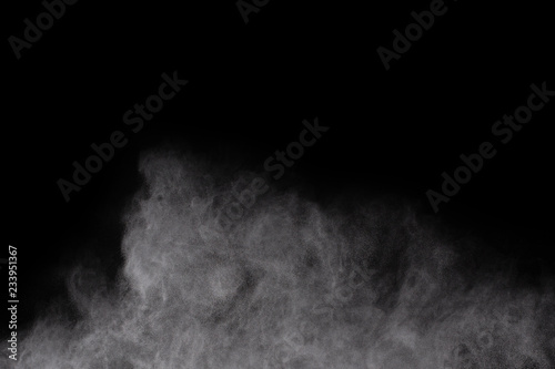 White powder explosion on white background. Colored cloud. Colorful dust explode. Paint Holi. © kitsana