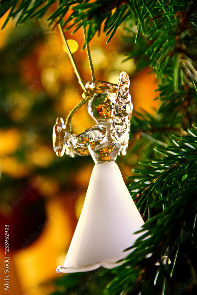 Toy glass angel decoration on the xmas tree