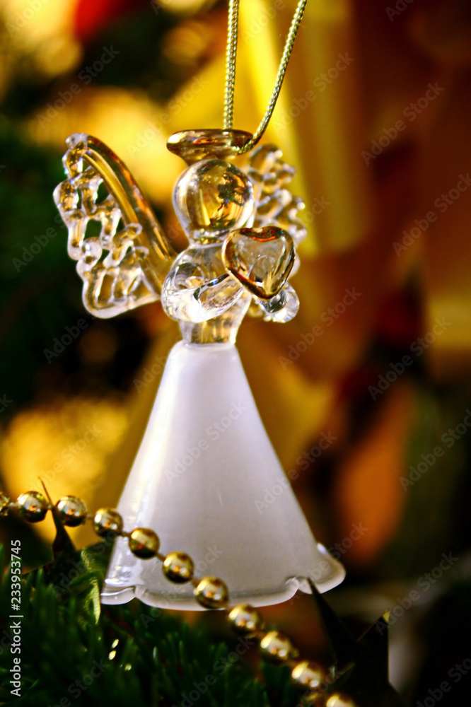 Toy glass angel decoration on the xmas tree