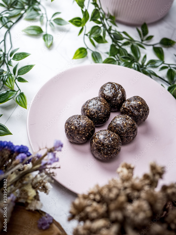 Healthy organic date energy balls with dark chocolate, dried fruits and nuts. Food for healthy lifestyle. Healthy organic date energy balls with dark chocolate, dried fruits and nuts. Food for healthy lifestyle.