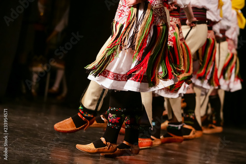 Young Serbian dancers in traditional costume. Folklore of Serbia
