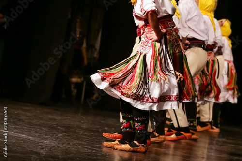 Young Serbian dancers in traditional costume. Folklore of Serbia