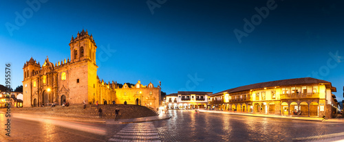 Cuzco, Peru: Panoramic view of Cathedral church and city at night. photo