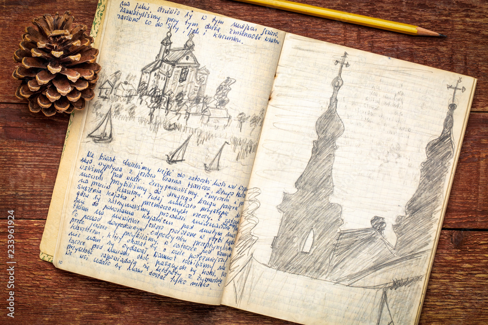 Fototapeta premium vintage expedition journal on rustic wood