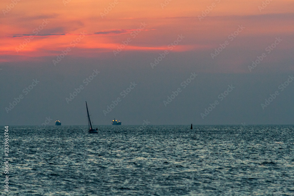 sea beach skyline with clouds and calm water sea beach skyline with clouds and calm water