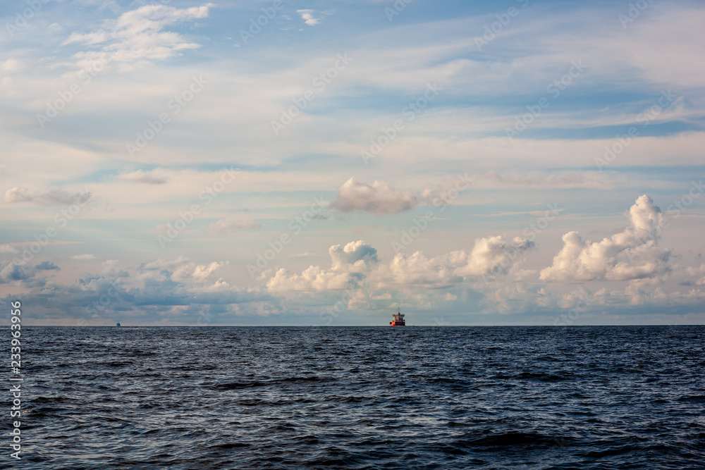 sea beach skyline with clouds and calm water sea beach skyline with clouds and calm water