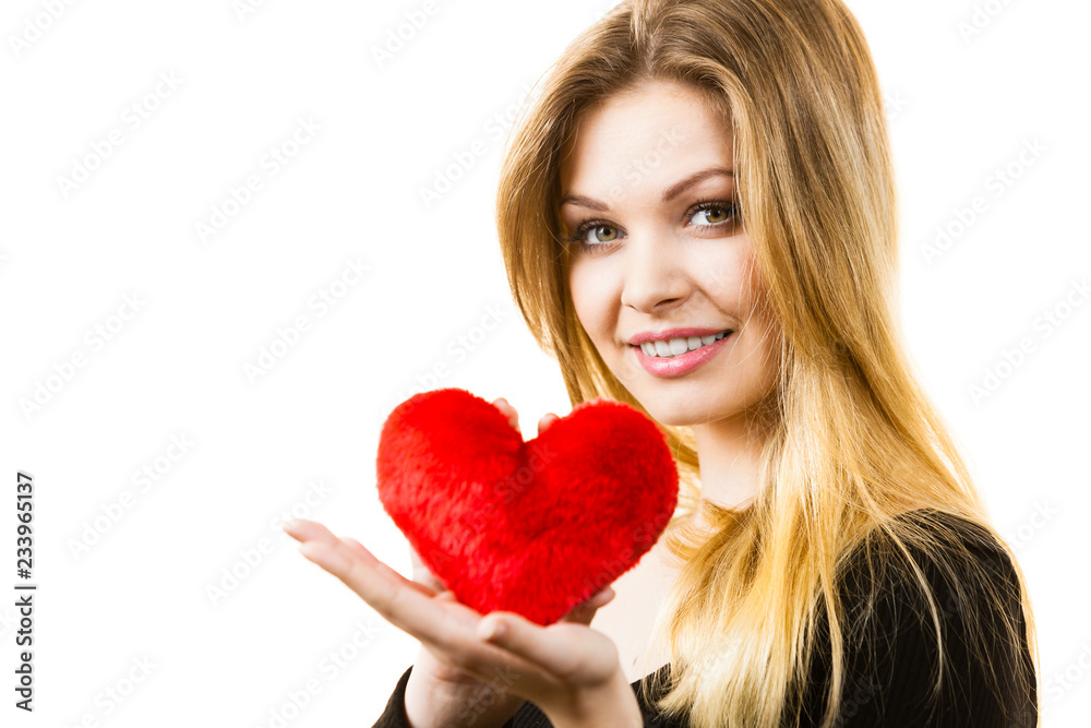 Woman holding red heart Woman holding red heart