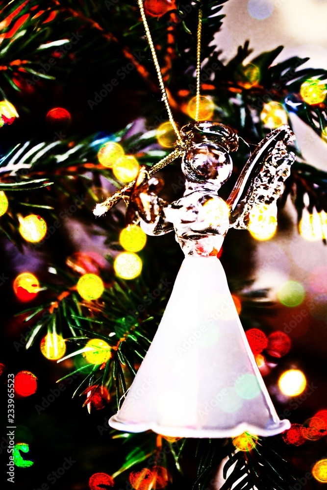 Toy glass angel decoration on the xmas tree