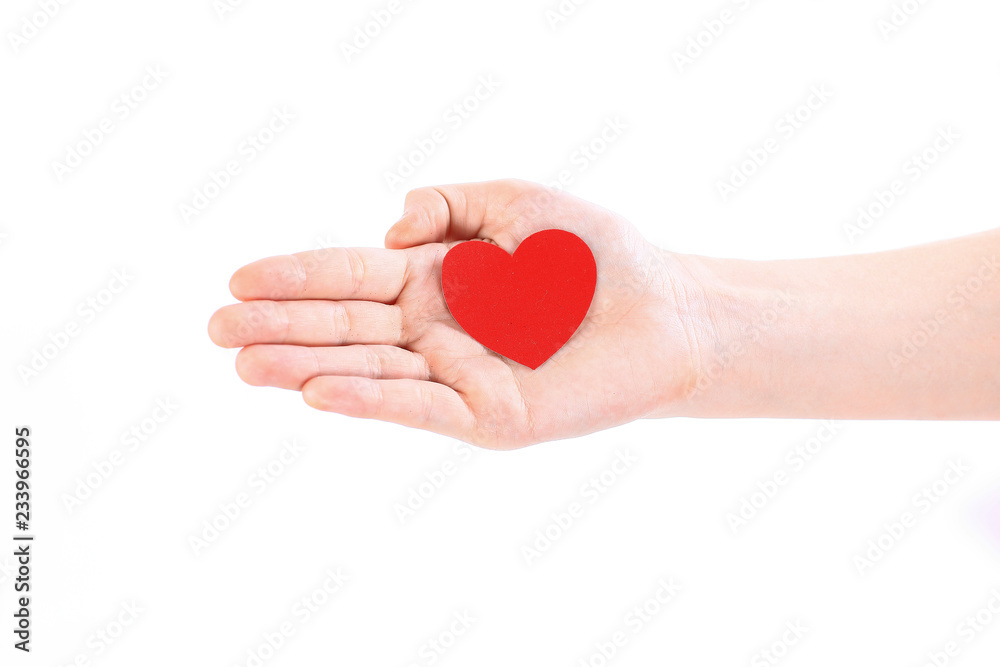 close up.paper red heart on the female hand.photo with copy spac close up.paper red heart on the female hand.photo with copy spac