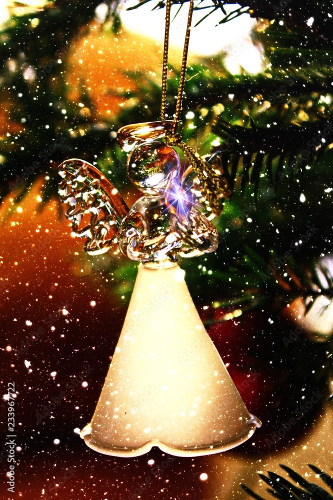 Toy glass angel decoration on the Christmas tree