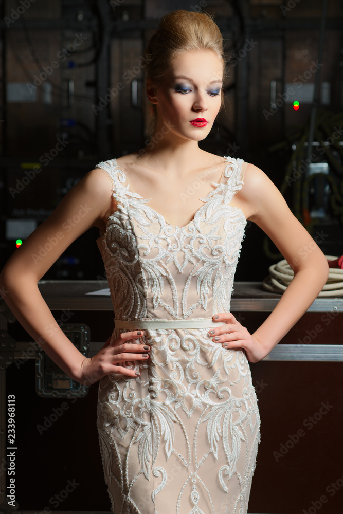 Fototapeta premium Beautiful girl with perfect skin in evening dress