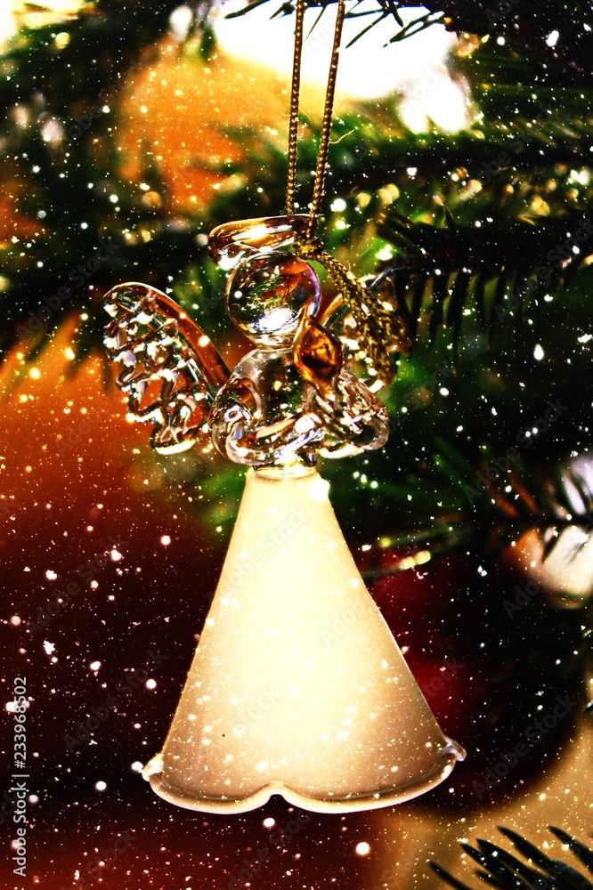 Toy glass angel decoration on the xmas tree