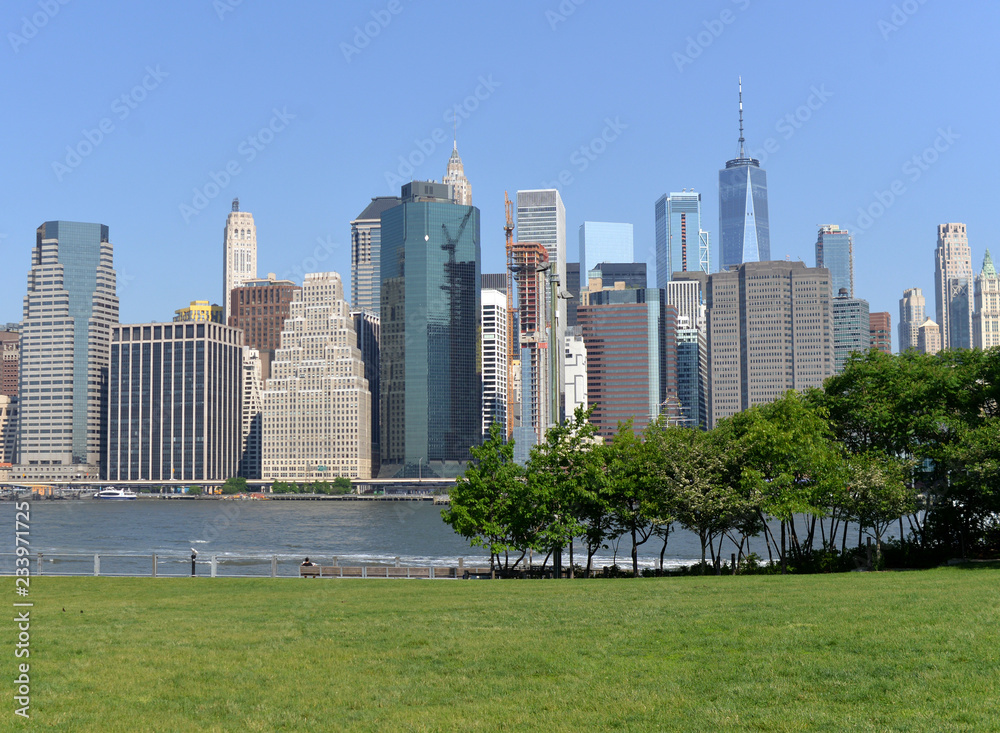 View on financial district in lower Manhattan from Brooklyn Bridge Park, New York.