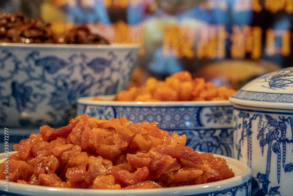 Chinese food in blue and white porcelain dishes
