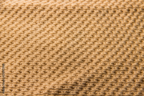 Light beige knitted background