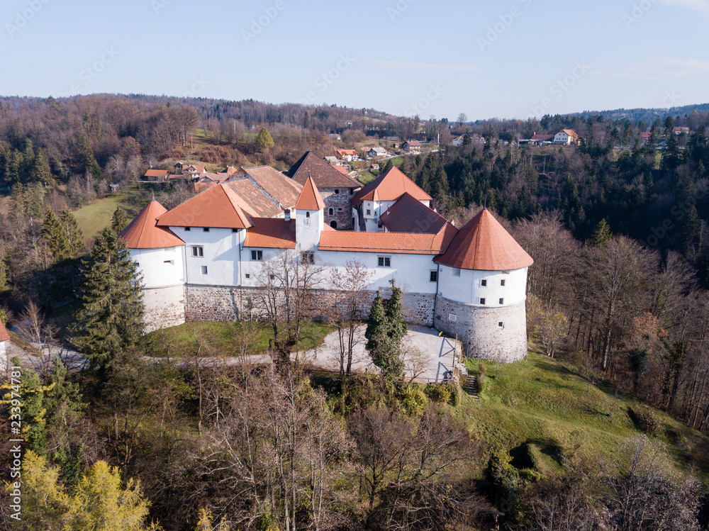 Turjak Castle ( grad Turjak or turjaški grad, German Burg Auersperg ) is a 13th-century castle located above the settlement of Turjak, Slovenia.