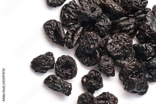 Dried prunes isolated on white
