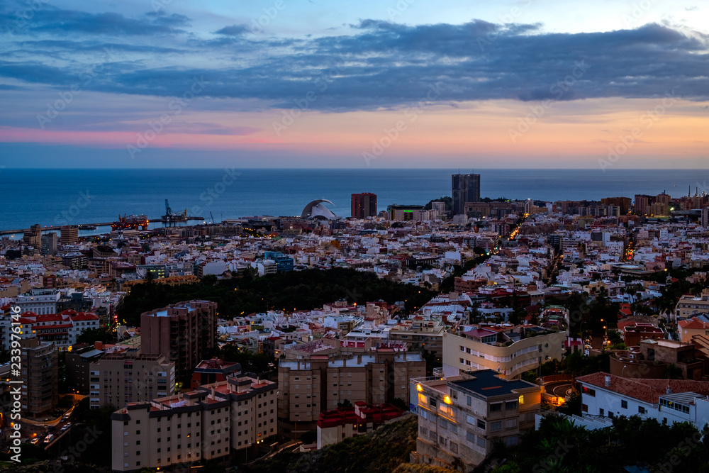 In the evening at the time of sunset an overview of Santa Cruz the capital of Tenerife.