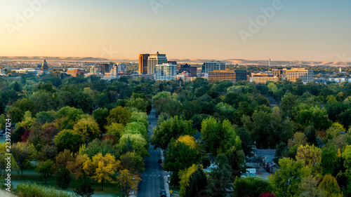Fototapeta Naklejka Na Ścianę i Meble -  First light on the little city of Boise Idaho with Fall tees at sunrise