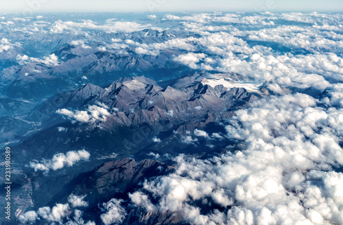Natural Cloudy sky background with alps, high angle view.