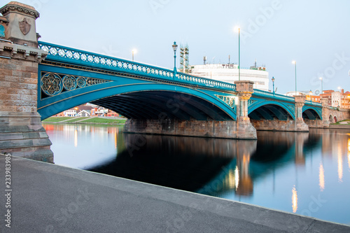 Long Exposure of Bridge in Nottingham, UK, with reflecting lights and embankment