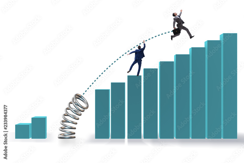 Businessman outperforming his competition jumping over Businessman outperforming his competition jumping over