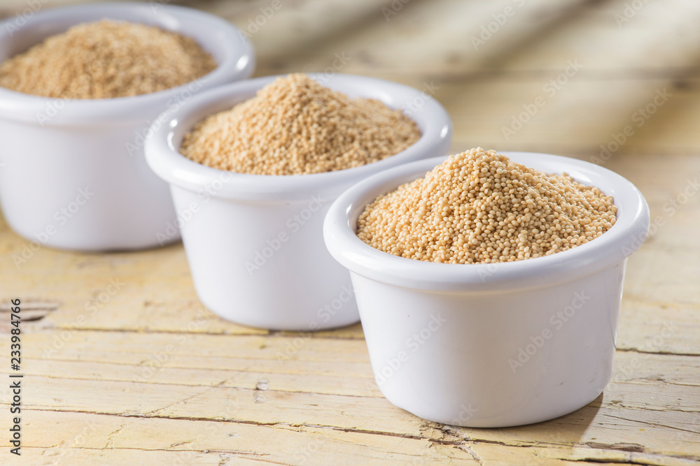amaranth beans in bowl, on rustic wooden background amaranth beans in bowl, on rustic wooden background