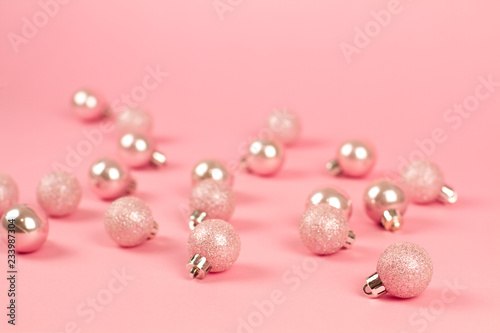 Fashion сhristmas decoration on pink background. Closeup of pink christmas . Trendy minimal concep. pastel color