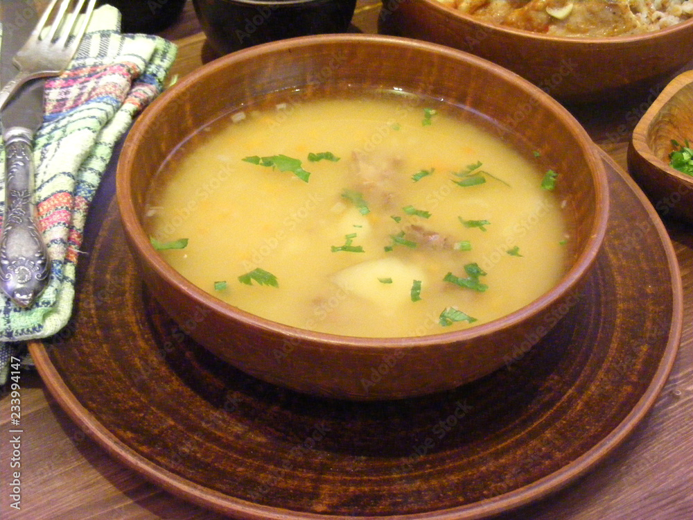 Healthy food. Traditional pea soup on wooden table Healthy food. Traditional pea soup on wooden table